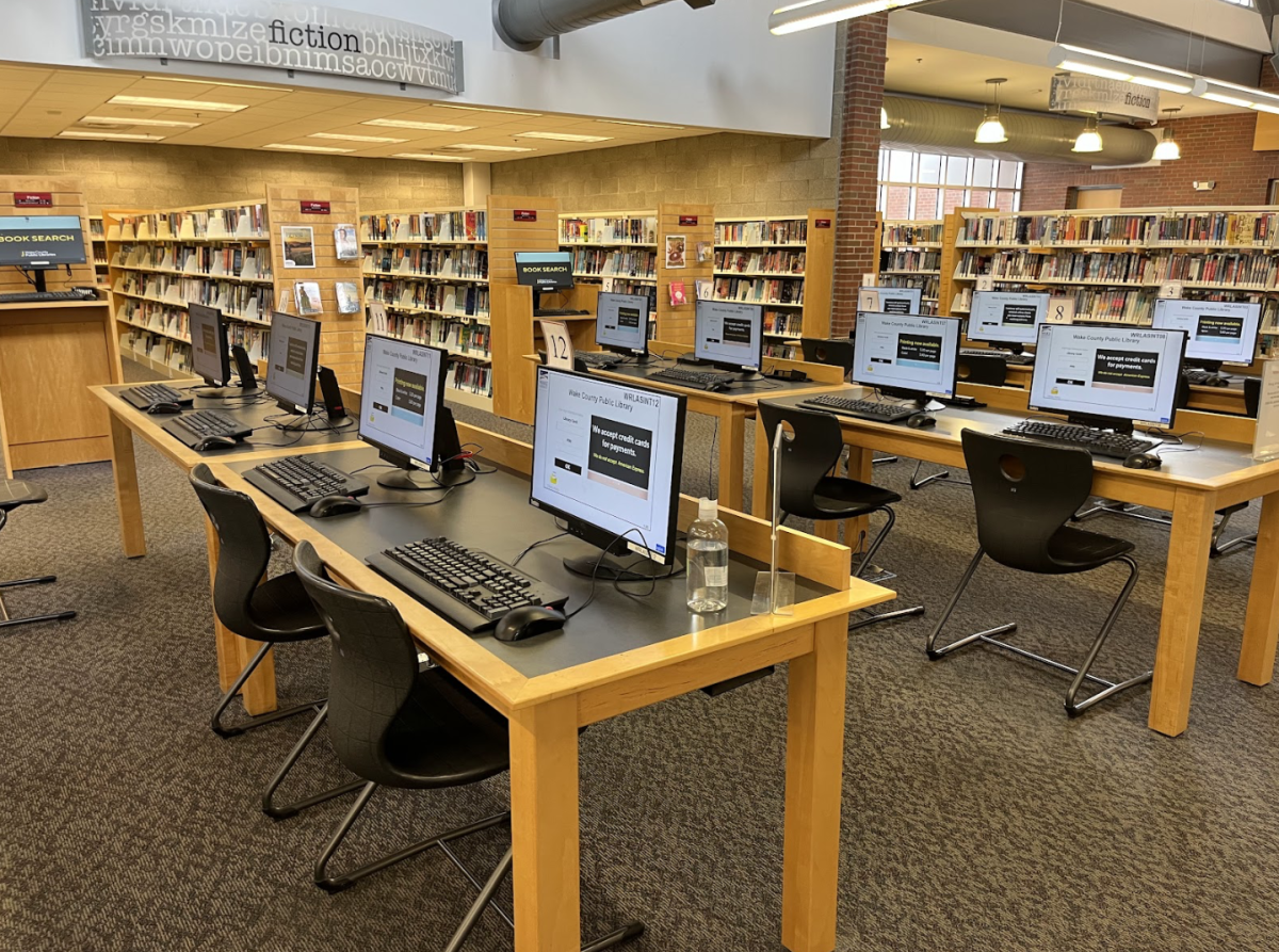 The West Regional Library provides computers for public use and multiple tables for studying.